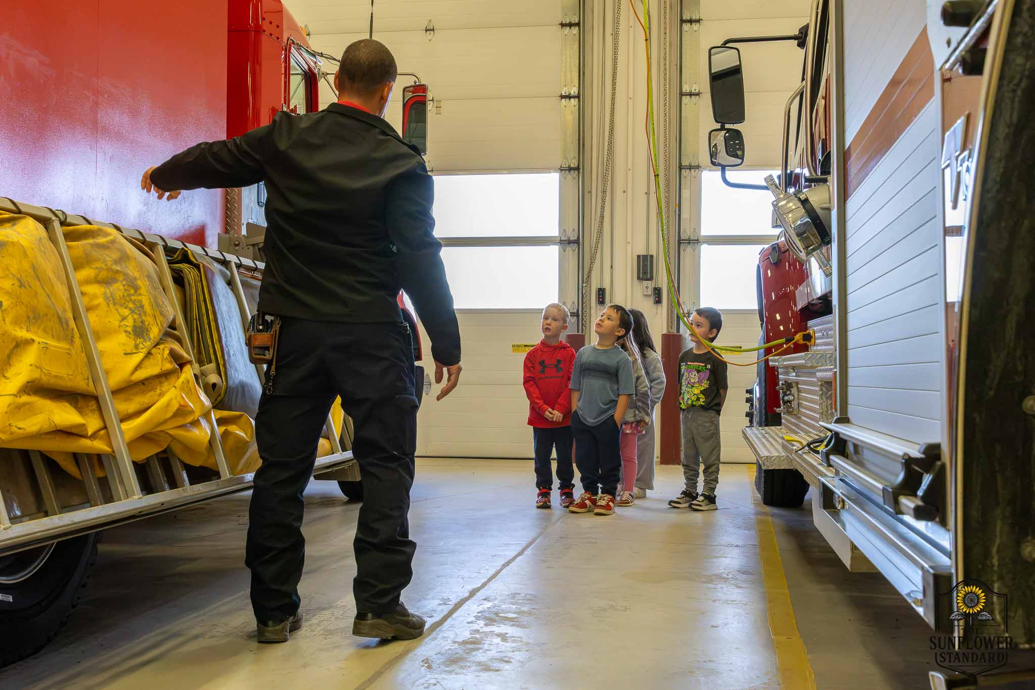 Sacred Heart students touring the Colby Fire Department