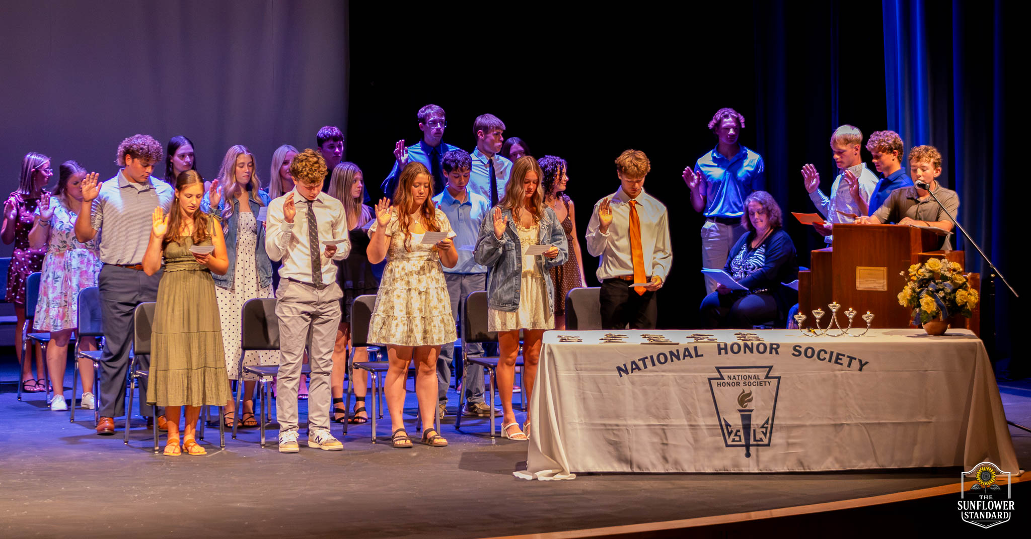 Students participating in the National Honor Society induction ceremony at Colby High School