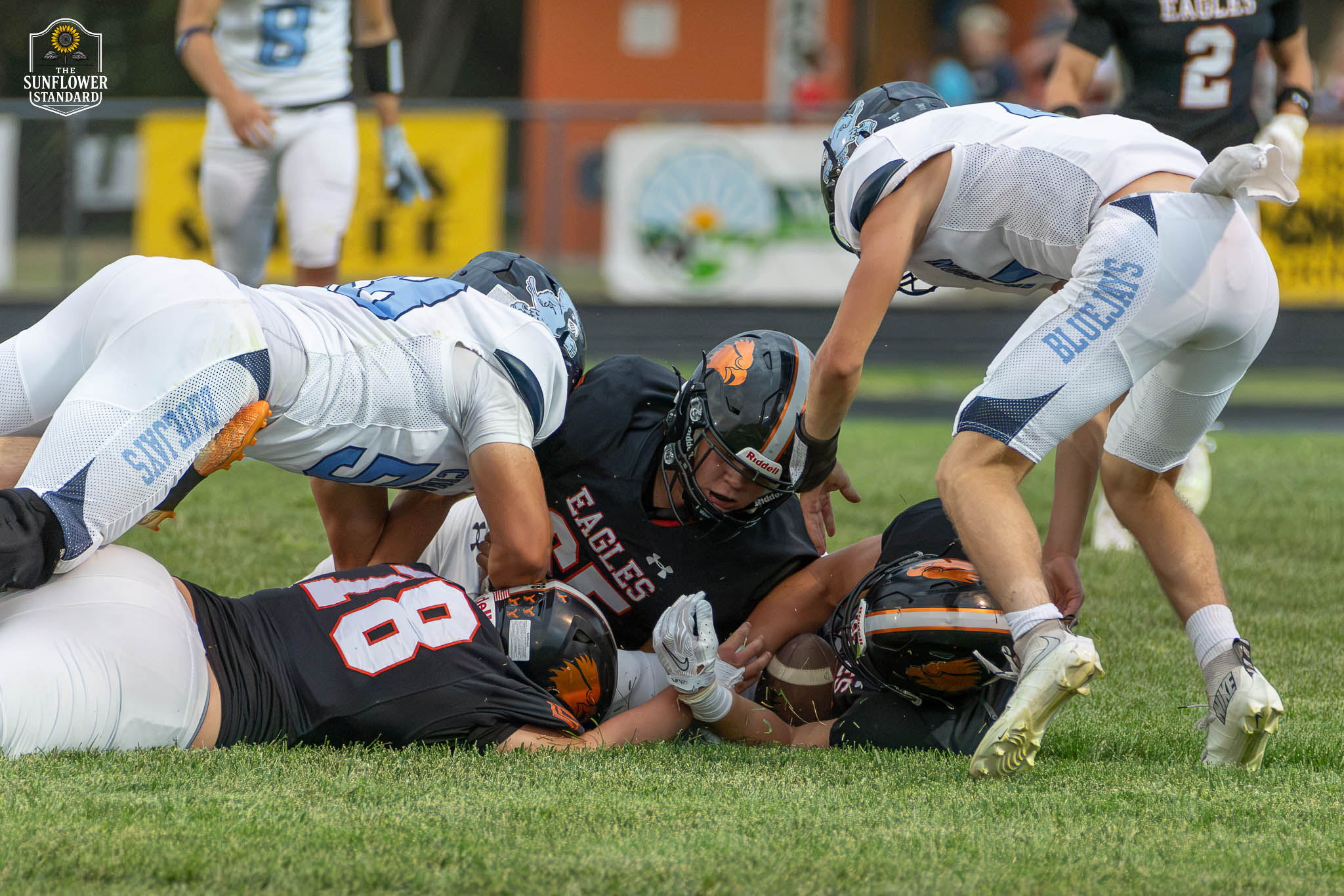 Colby Eagles football player in action